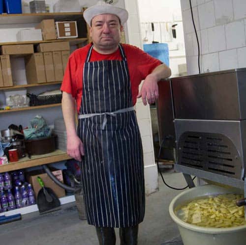 Paul, the chips maker at the Newington Fish Bar
